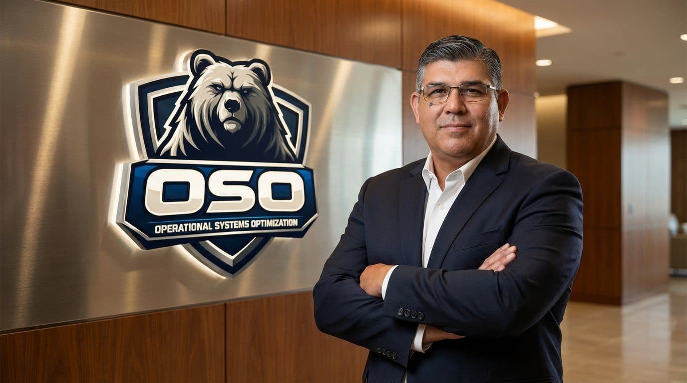 Daniel Sanchez, founder of OSO, beside the OSO shield logo